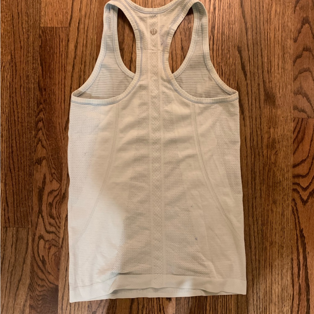Lulu lemon size 4 light blue tank run swiftly tech